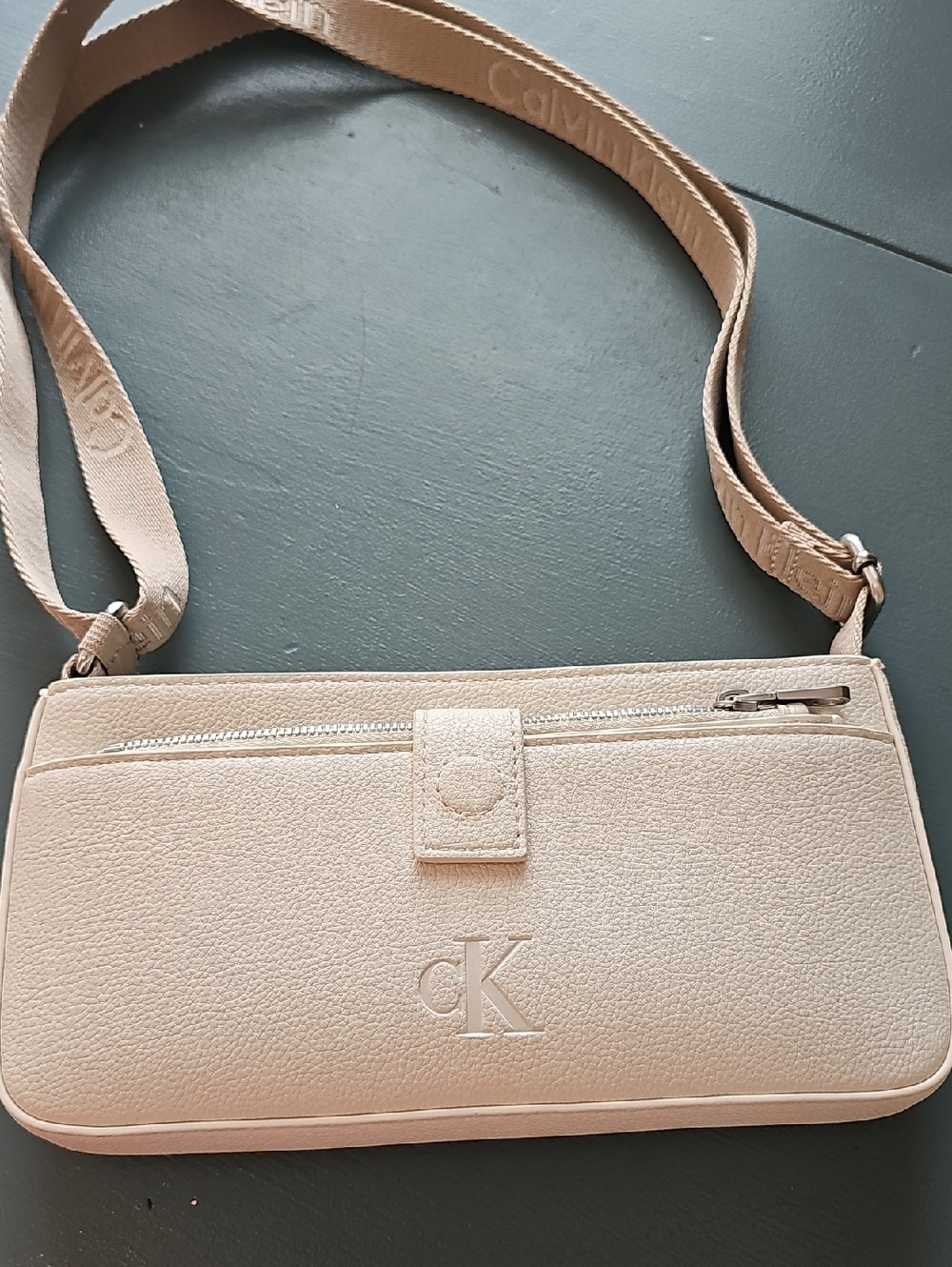 Calvin Klein Cream Crossbody Bag‎ with Embossed CK Logo. NEW Never Used.